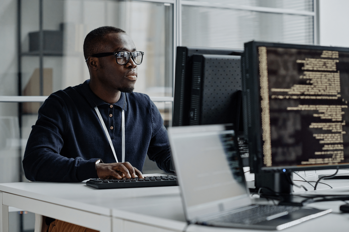 Cybersecurity professional working on his computer